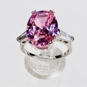 Elegant Sterling Silver Ring with Facet Cut Pink Gemstone and Baguettes